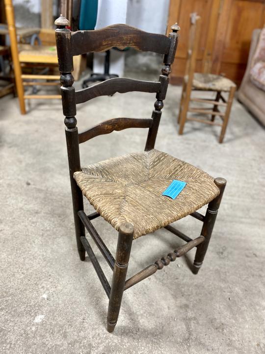 Single wood and rattan chair - €10